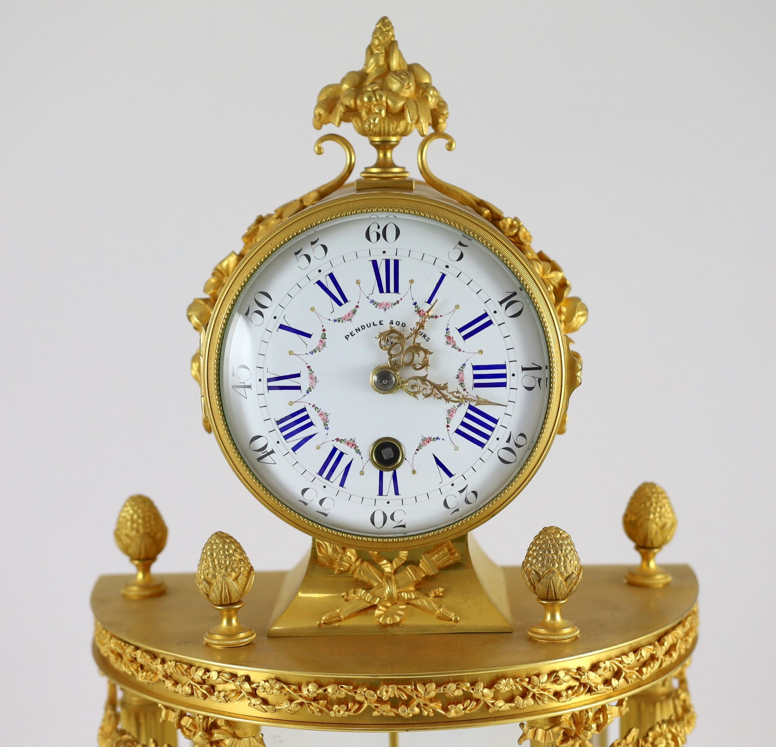 An early 20th century French ormolu 400 day mantel clock, width 26cm, depth 15cm, height 52cm